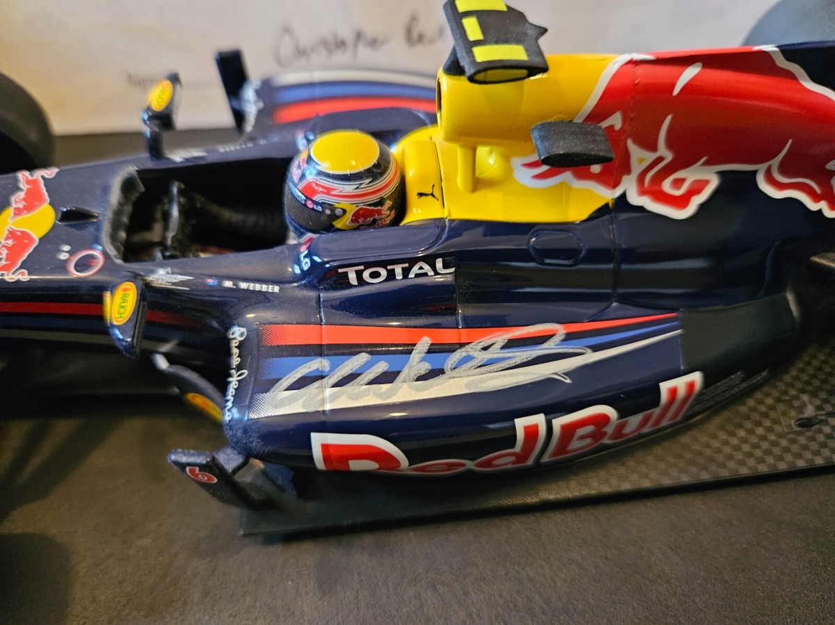 1/18 Minichamps Red Bull RB6 Mark Webber signed on sidepod