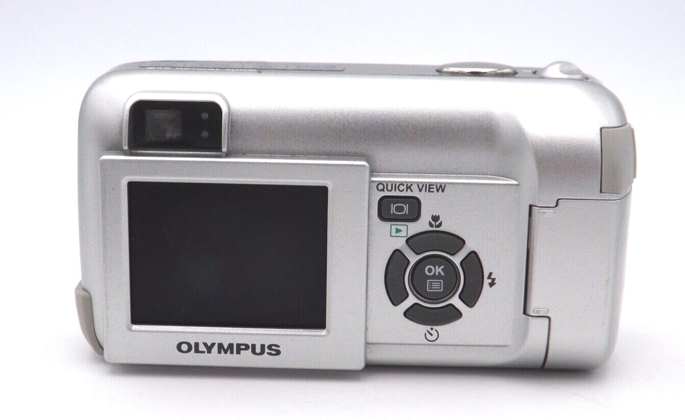 Olympus CAMEDIA D560 Zoom 3.2MP Digital Camera Silver 2.M1