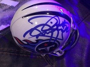 Autographed Derrick Henry mini Helmet in a case - COA by autographCOA