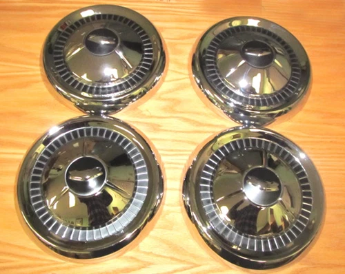 1957 CHEVY HUB CAPS with RAISED CREST EMBLEMS 150-210 Models Set of 4