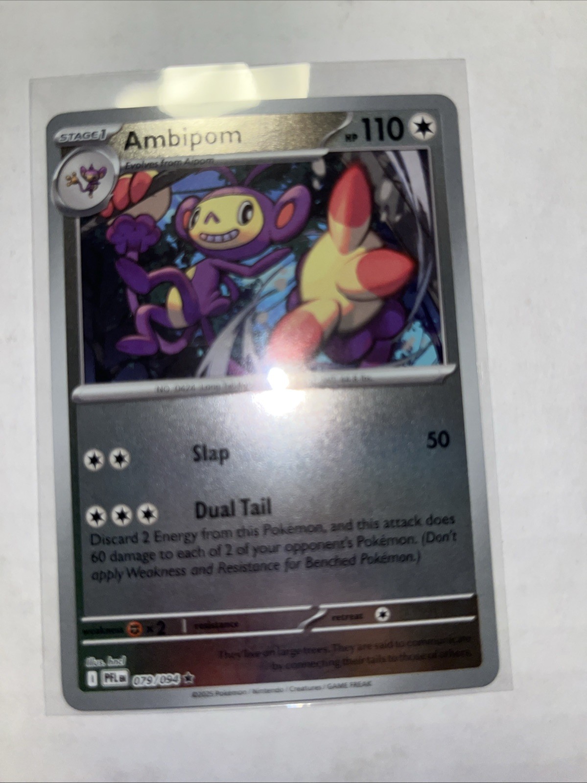 Ambipom 079/094 Me02: Phantasmal Flames Reverse Holo