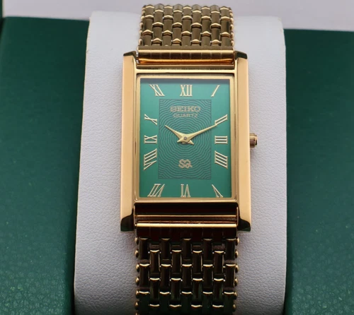 Vintage Seiko Slim Quartz Men's Wrist Watch Green Dial with Gold Bracelet.