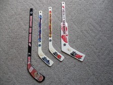 Lot of 4 NHL Mini Hockey Sticks