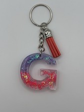 Alphabet Resin Letter Keychain Orange And Purple Stars Featuring The Letter G