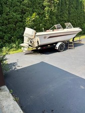 1976 Chrysler Courier 17 ft boat with 105 HP Chrysler Outboard and Trailer