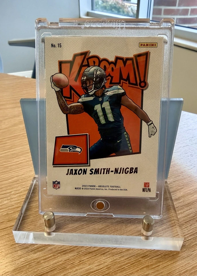 2023 Panini Absolute #15 Jaxon Smith-Njigba RC Rookie Kaboom Horizontal Case Hit - Image 2 of 2
