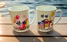 2 YOKOTA AIR BASE COFFEE MUGS. ON BASE SOUVENIR GIFTS . VINTAGE.