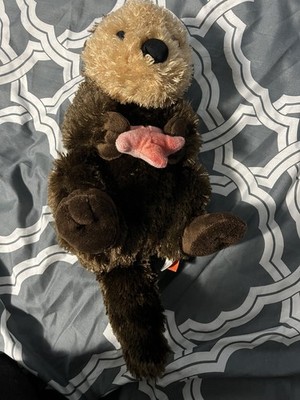 Wild Republic 12'' Sea Otter plush stuffed animal toy holding red Starfish 