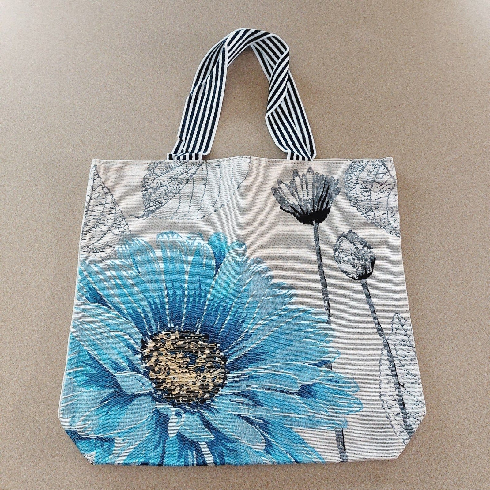 Large Blue Daisy Flower Pattern Beige Canvas Tote Bag with Black & White Handles