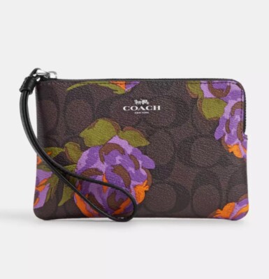 Coach Corner Zip Wristlet In Signature Canvas With Purple￼ Rose