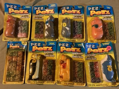 Vintage lot of 7 PEZ Petz Bubble Gum Dispensers plus gum