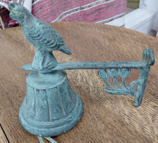 Vintage cast iron bird garden bell. Working and mounting holes.