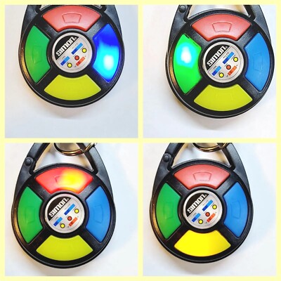 Simon Keychain Simon Keychain Hasbro 2014 Handheld Electronic Game Bag Clip Miniature ...