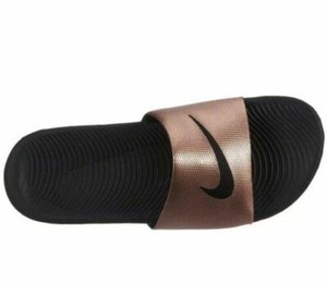 bronze nike slides