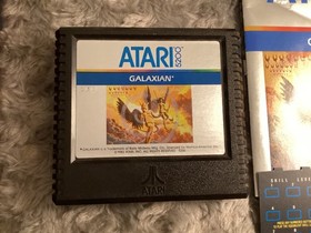 Mint condition cartridge of Galaxian Atari 5200 1981 complete with overlays