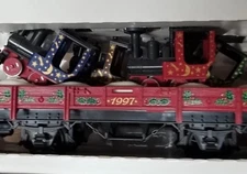 1997 LGB Christmas car 42100, 4 small locomotives on flatcar . Brand New.
