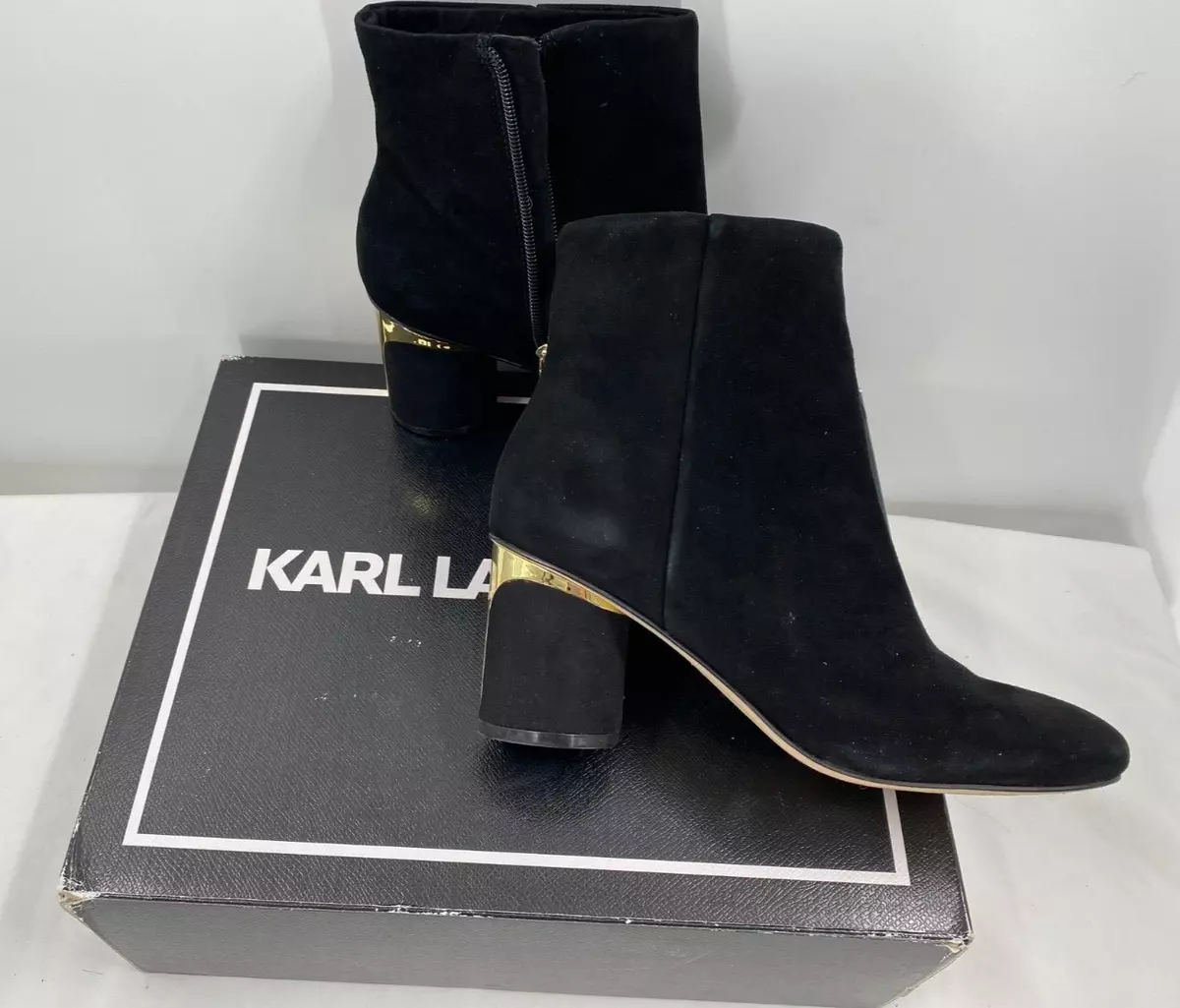 Black booties hot sale with gold heel