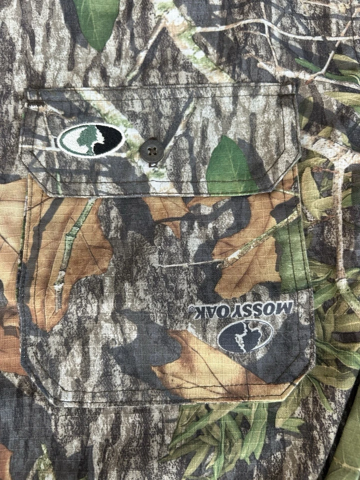 Camisa de caza Mossy Oak camuflada con botones para hombre grande transpirable Foto 2 de 4