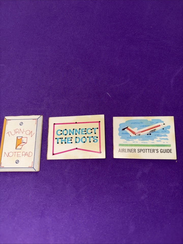An actual 1974 Cracker Jack prize — a tiny Eye Tickler optical illusions booklet that's a perfect micro-artifact of mid-century American pop culture.