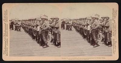 German troops on the dock at Tongu awaiting transportation to Tientsin, China.