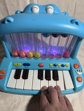 Battat B. Toys Hippo Pop Toy Piano keyboard Light Up Keys Popping Ball