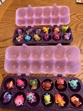 24 Hatchimals Colleggtibles With 2 Purple Cases