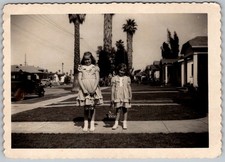 Vtg B&W Snapshot Two Girls In Ruffled Dresses On A Suburban Sidewalk CA 1930s