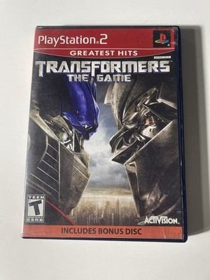 Transformers The Game PS2 Complete W/ Manual + 2disc. Tested and works