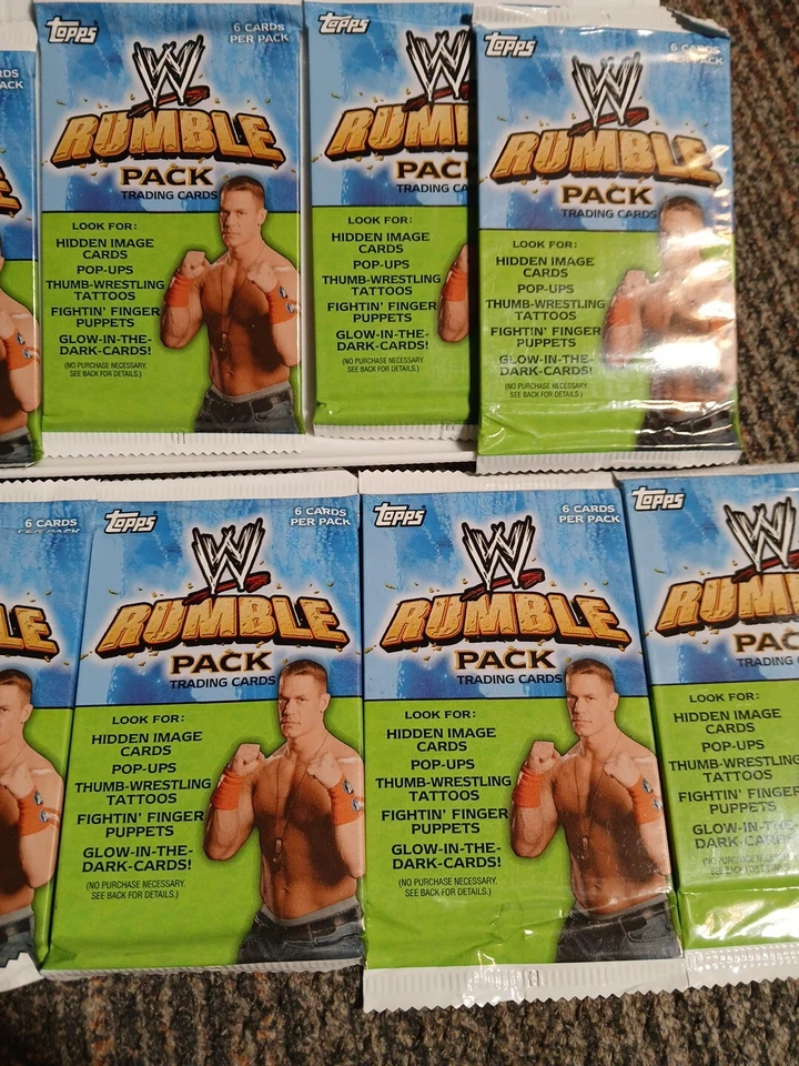 Lote de 10 paquetes de cera de lucha libre nuevos sellados WWE Rumble Pack 2010 Topps WWF Foto 4 de 4