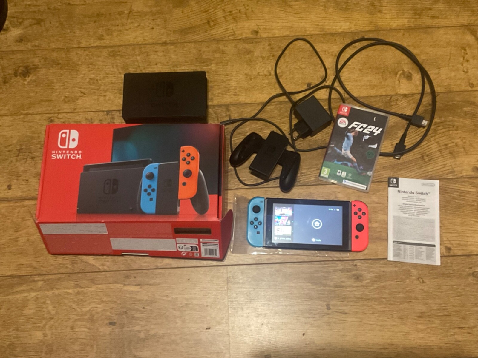 Set Nintendo Switch Oled usata + scheda 256gb + giochi FC24 e altro