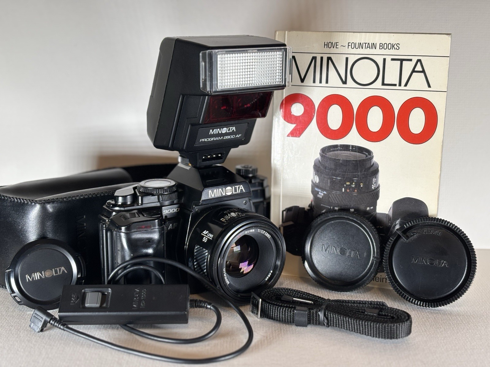 Minolta 9000 AF SLR Camera with 50mm f/1.7 Lens, Flash, Remote, Strap and Manual