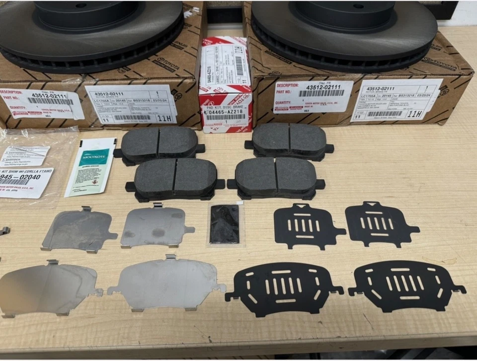 Toyota Corolla 2003-2007 genuino fabricante original nuevo rotores de freno delanteros pastillas y cuñas TCMC Foto 2 de 4