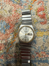 Bulova Dual-Day Automatic Men’s Day/Date Silver Dial Steel Gold Bezel Watch