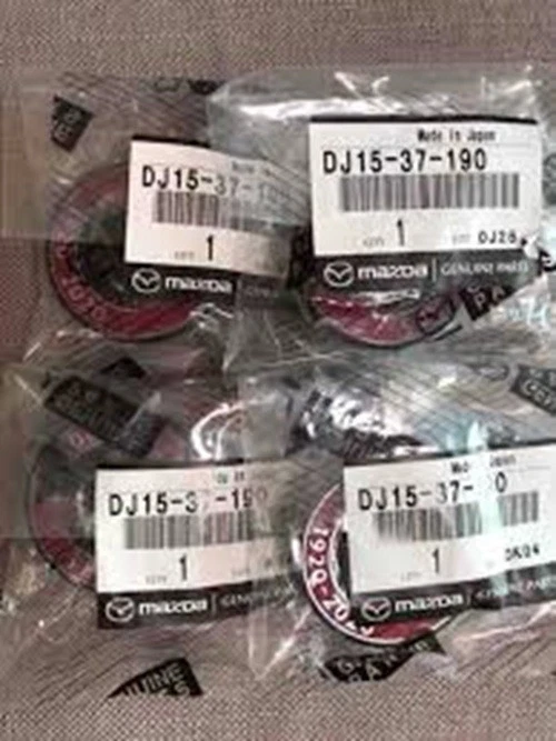 Juego de 4 tapas centrales de rueda originales Mazda JDM OEM 100 aniversario MX-5 DJ15-37-190 Foto 2 de 3