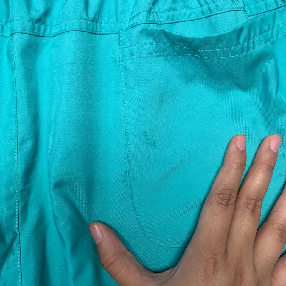 Pantalones cortos de natación forrados de malla con cordón verde azulado talla XL de secado rápido Nike para hombre Foto 4 de 4