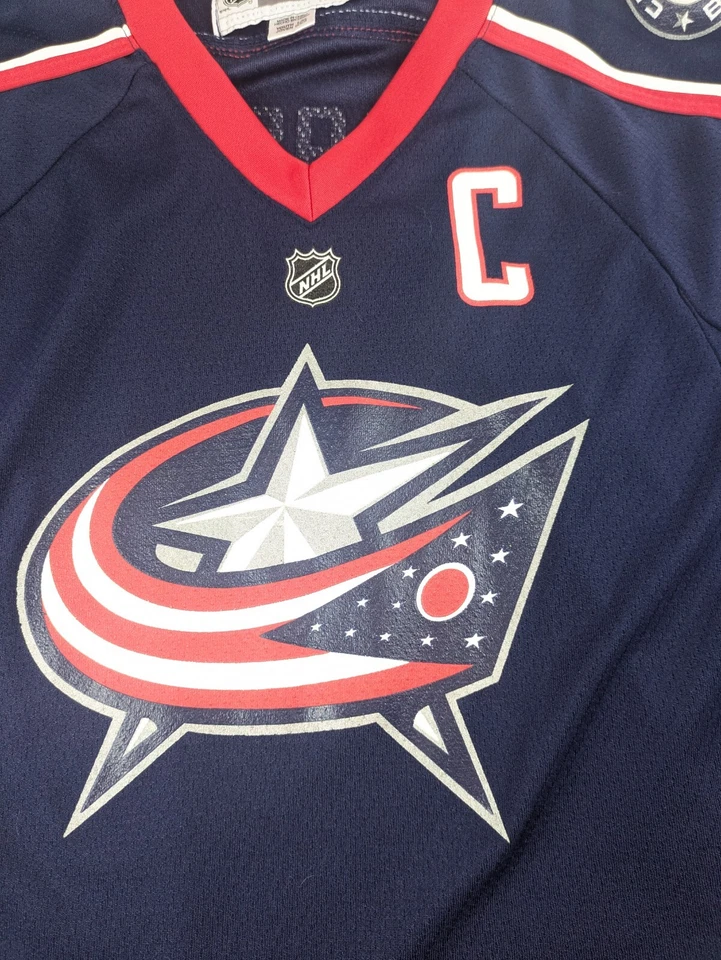 Camiseta deportiva de hockey vintage CCM YOUTH L XL Columbus Blue Chaquetas Rick Nash #61 Capitán Foto 3 de 4