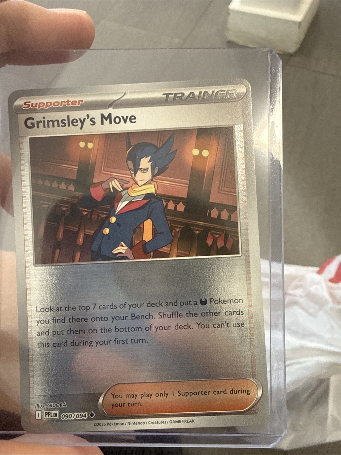 Grimsley's Move 090/094 Me02: Phantasmal Flames Reverse Holo