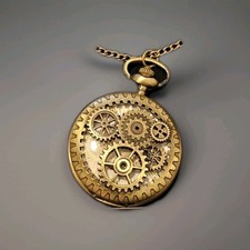 bronze-toned steampunk-style pocket watch necklace featuring a decorative...