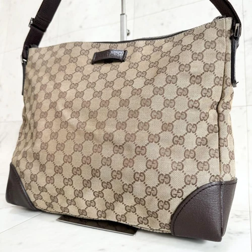 Sac bandoulière Gucci GG suprême toile cuir beige grande capacité occasion excellent