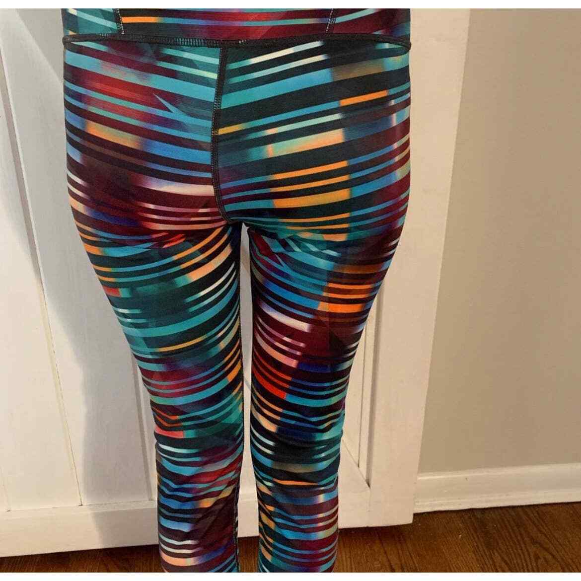Athleta Multi-colored striped capri leggings size… - image 1