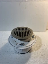 Zurn Adjustable Cast Iron Drain 4" Pipe Size. Brass Round Drain Top Size 6”.