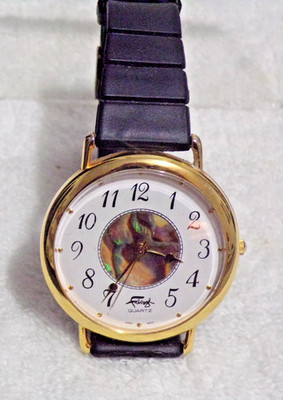 Faberge Vintage Pearl Luster Watch with Black Band and Gold Trim on Face Works