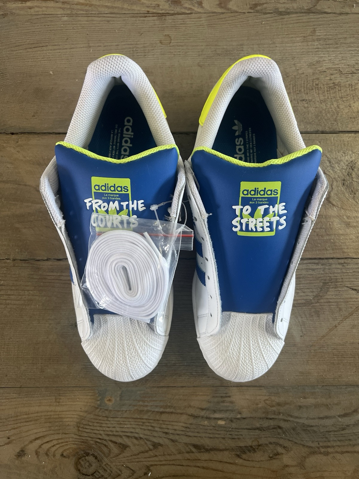 Size 10.5 - adidas Superstar Laceless White Blue Yellow