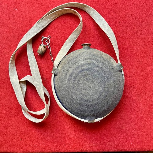 Repro CW Gray Wool Bullseye Canteen with strap, used.