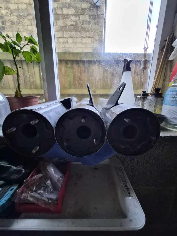 Latas de extremo originales Honda NS400R Foto 3 de 4