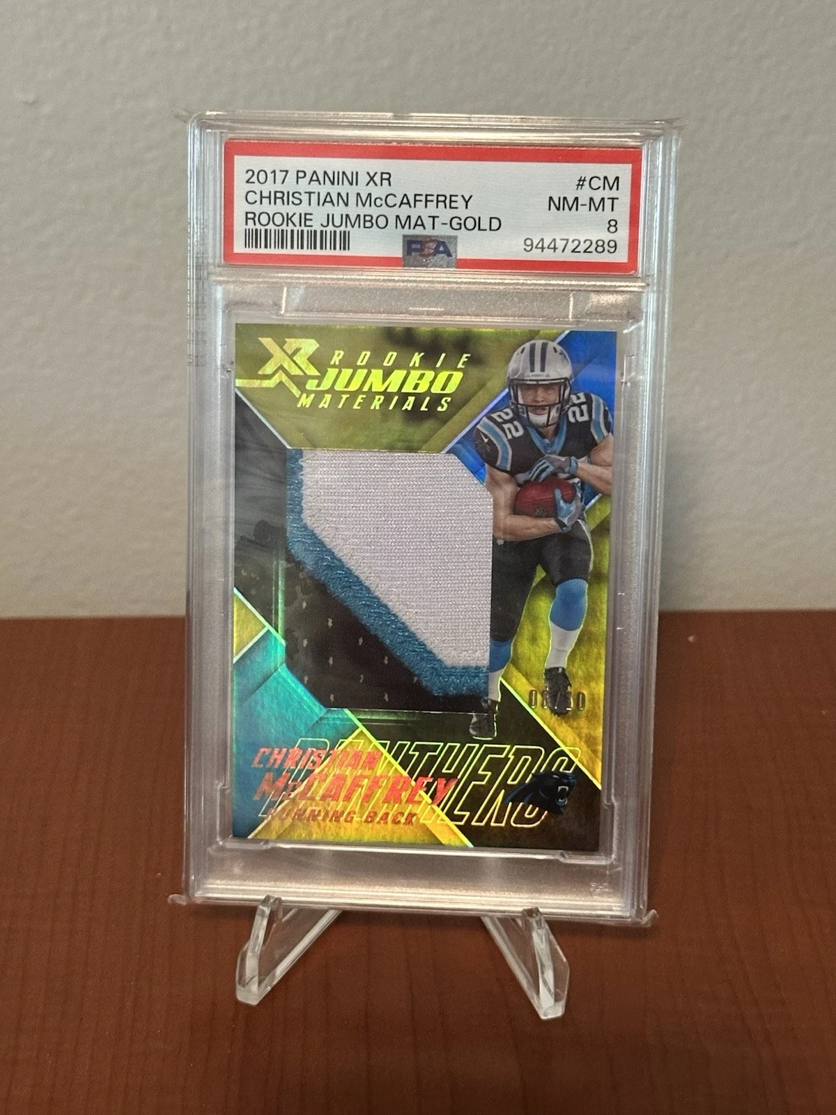 Christian McCaffrey Panini XR Rookie Jumbo Materials #CM Gold