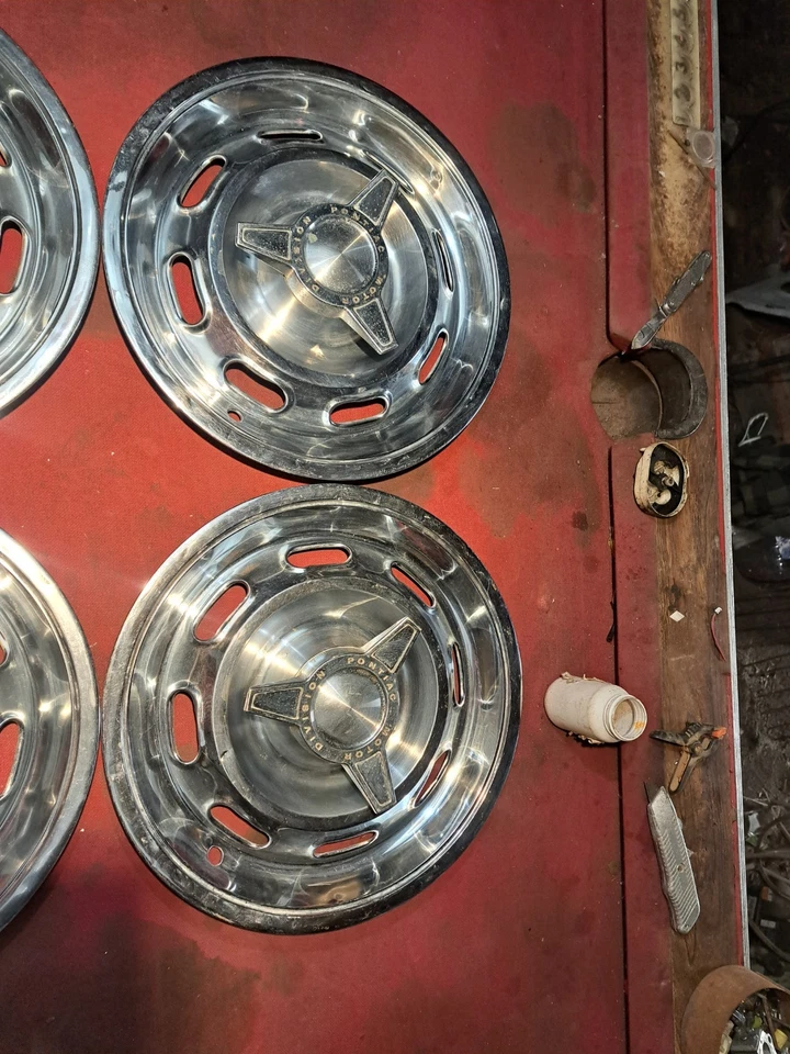 Pontiac GTO 1964 Lemans Tempest tapacubos giratorios juego de 4 cubiertas de rueda originales Foto 2 de 3