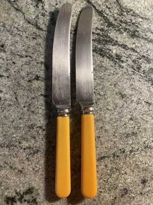 2 Vntg. Thos & Osbourne Table Knives.Stainless Steel Blades & Celluloid Handles.