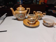 This item is a vintage Japanese lusterware tea set Missing One Lid Please See Ph