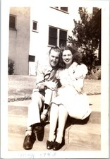 1945 Happy Couple Sitting On Steps Military Man Woman Vintage Photo